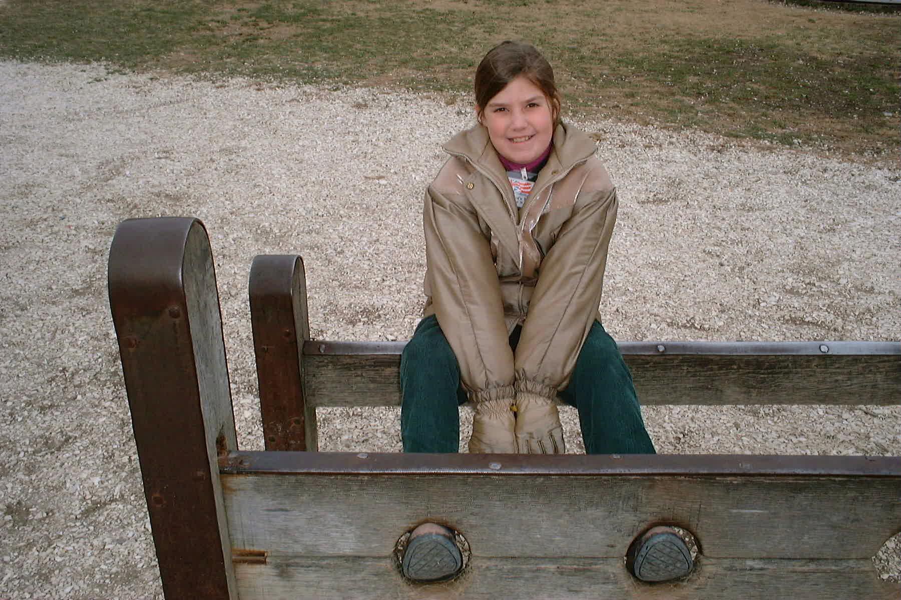 Danielle sitting on top of the stocks