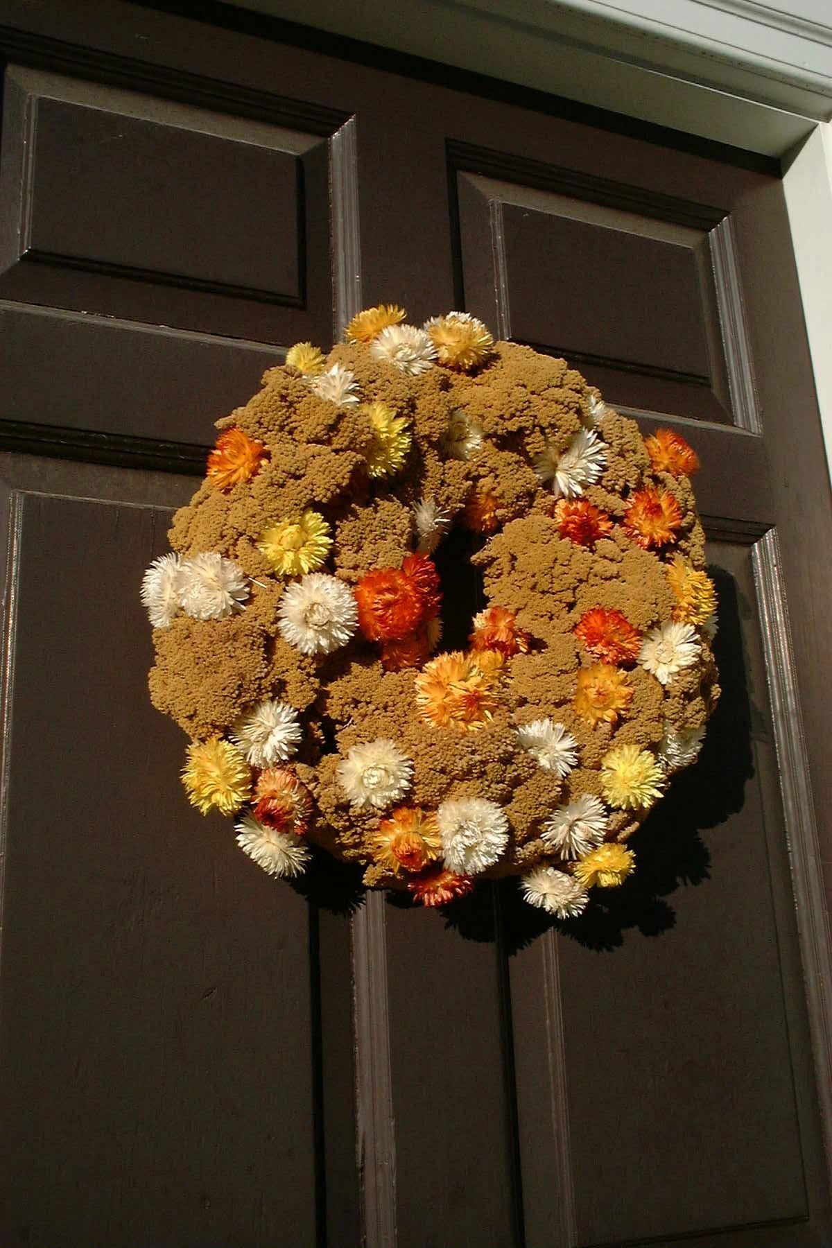 Dried flower wreath on a colonial door